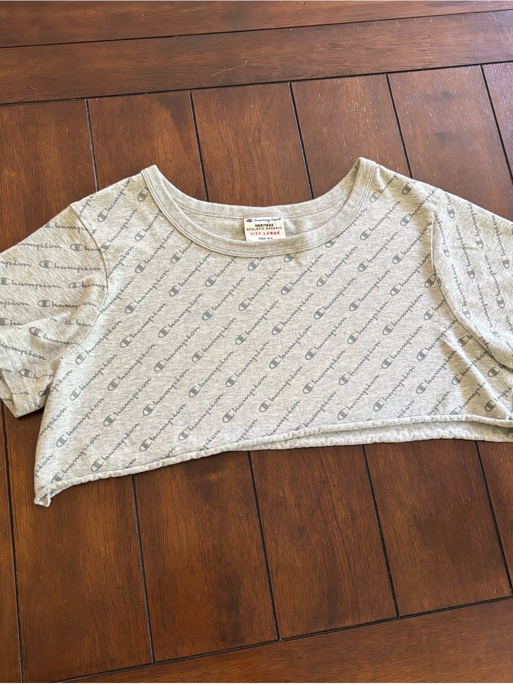 Champion All-Over Logo Cropped Tee in Heather Gray